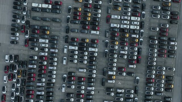 Aerial view new car lined up, Automobile automotive car parking lot commercial business industry, Port of import export business logistic dealership, New cars global business logistic import export.