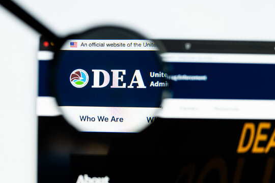Milan, Italy 2026, 15 AGO Closeup of Drug Enforcement Administration website page on a laptop screen. Focus on Drug Enforcement Administration logo under a magnifying glass.
