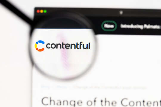 Milan, Italy 2026, 15 AGO Closeup of contentful website page on a laptop screen. Focus on contentful logo under a magnifying glass.