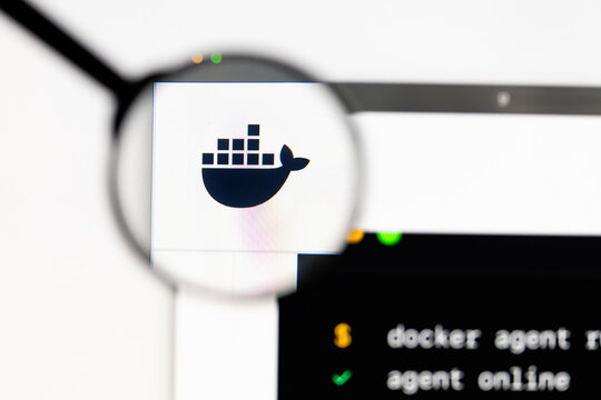 Milan, Italy 2026, 15 AGO Closeup of docker io website page on a laptop screen. Focus on docker io logo under a magnifying glass.