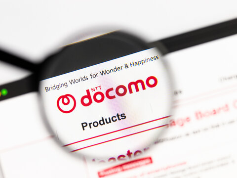 Milan, Italy 2026, 15 AGO Closeup of docomo website page on a laptop screen. Focus on docomo logo under a magnifying glass.