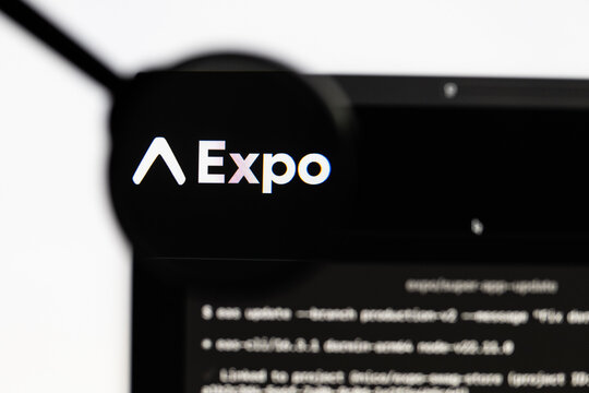 Milan, Italy 2026, 15 AGO Closeup of expo dev website page on a laptop screen. Focus on expo dev logo under a magnifying glass.