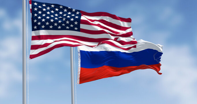 National flags of Russia waving in the wind on a clear day