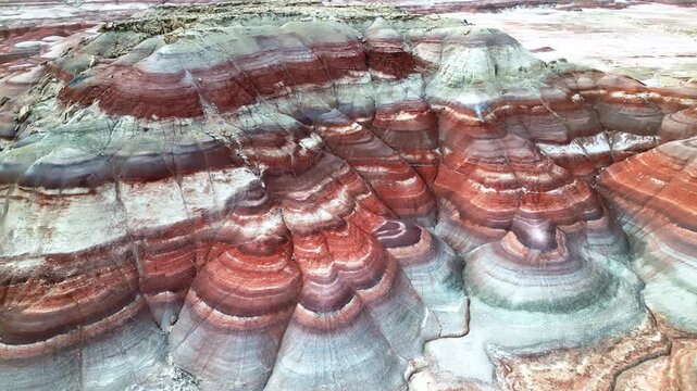Aerial footage of the Bentonite Hills near Hanksville, Utah. Dramatic, unusual and colorful abstract background video, landmark, travel destination