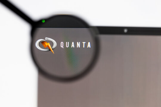 Milan, Italy 2026, 15 AGO Closeup of Quanta Services website page on a laptop screen. Focus on Quanta Services logo under a magnifying glass.