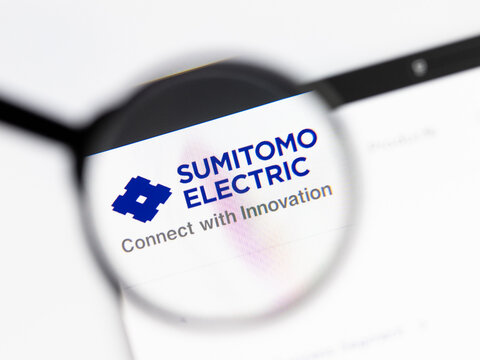 Milan, Italy 2026, 15 AGO Closeup of Sumitomo Electric website page on a laptop screen. Focus on Sumitomo Electric logo under a magnifying glass.