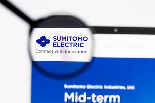 Milan, Italy 2026, 15 AGO Closeup of Sumitomo Electric website page on a laptop screen. Focus on Sumitomo Electric logo under a magnifying glass.