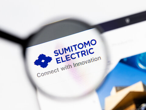 Milan, Italy 2026, 15 AGO Closeup of Sumitomo Electric website page on a laptop screen. Focus on Sumitomo Electric logo under a magnifying glass.