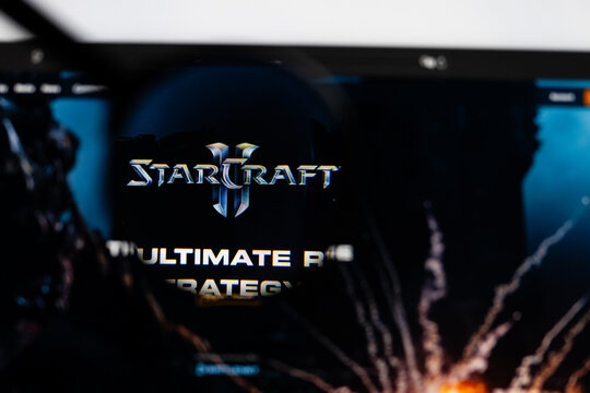 Milan, Italy 2026, 15 AGO Closeup of StarCraft II website page on a laptop screen. Focus on StarCraft II logo under a magnifying glass.