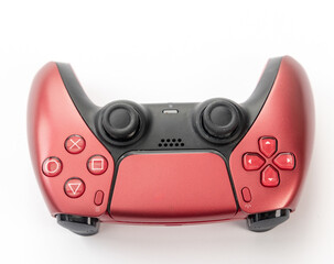 Vibrant Red Wireless Gaming Controller on a Clean White Background © YouraPechkin