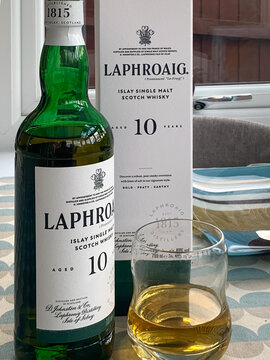 A recently opened boxed Laphroiag Islay Single Malt Scotch Whisky bottle