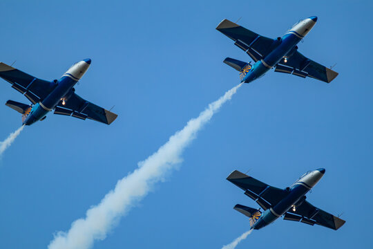 Kharkiv, Ukraine - August 29, 2021: L-29 Delfin jet airplanes group close-up at airshow in blue sky
