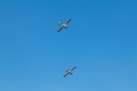 Kharkiv, Ukraine - August 29, 2021: Two ViS-3 KhAZ-30 monoplanes in blue clear sky at airshow