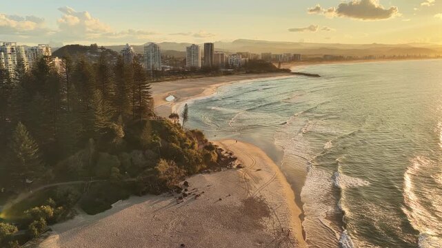 Golden hour along the Coolangatta beachfront, aerial drone view, Gold Coast, Queensland Australia