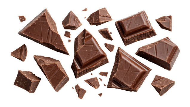 Dark chocolate chunks scattered, isolated on transparent background