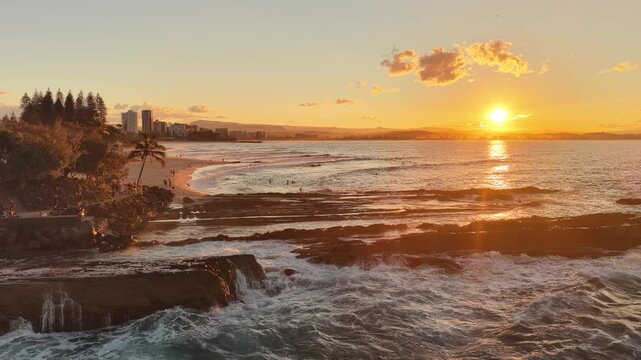 Golden hour above Snapper Rocks and Rainbow Bay, aerial drone footage, Gold Coast, Queensland Australia