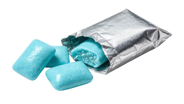 Blue rectangular chewing gum pieces spilling from a silver foil wrapper, isolated on transparent background
