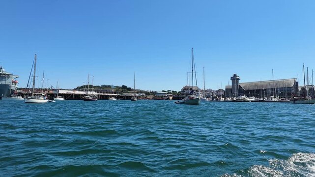 Falmouth Cornwall,England UK. 20.08.2026. Video. View from a boat crossing Falmouth Harbour to St Mawes passing a museum and boat moorings.