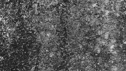 Obraz premium High contrast weathered stone texture featuring coarse grain and irregular tonal patterns, creating a dramatic monochrome background for abstract art and creative design.
