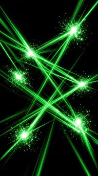 Abstract green laser beams intersecting with bright glowing sparks on a black background