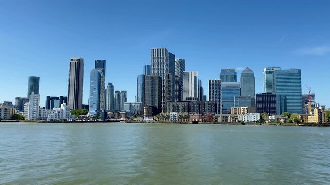 London skyscraper skyline cityscape of Canary Wharf Docklands across Thames