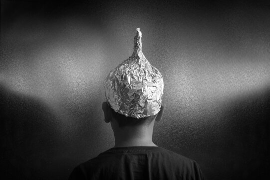 A tin foil hat, conspiracy theory
