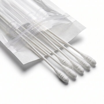 Sterile cotton swabs in clear packaging isolated on a clean white background