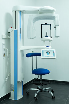 Modern dental 3D CBCT panoramic x-ray machine in radiology room