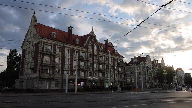 View of historic architecture with red-tiled roofs along a street in Kaliningrad, Kaliningrad Oblast, Russia.
