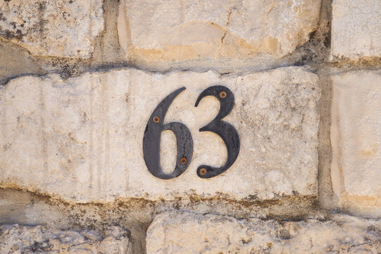 63 number on the wall