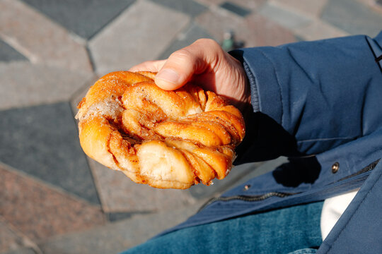 sunlit sugar-dusted kanelsnegl in Copenhagen