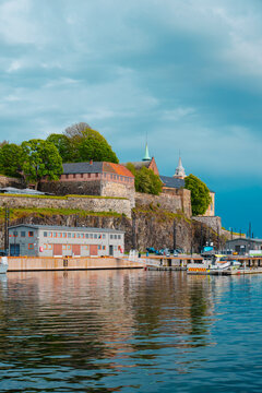 Akershus Fortress reflected in Oslo harbor, Norway