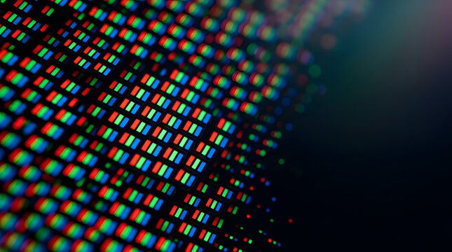 Close-up of Pixels: A macro shot revealing the intricate grid of red, green, and blue pixels on a digital screen, showcasing the building blocks of digital imagery.