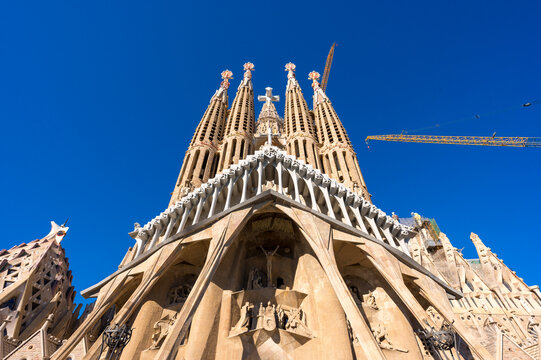 Barcelona, Spain - April 15, 2026: For over 140 years, famous Antoni Gaudi project - the Sagrada Familia church, is still under construction.