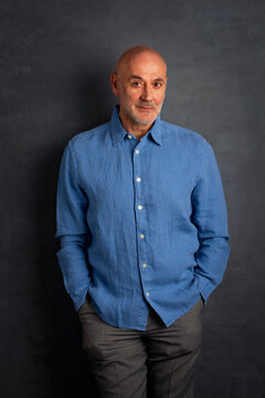 Portrait of a caucasian man against dark background