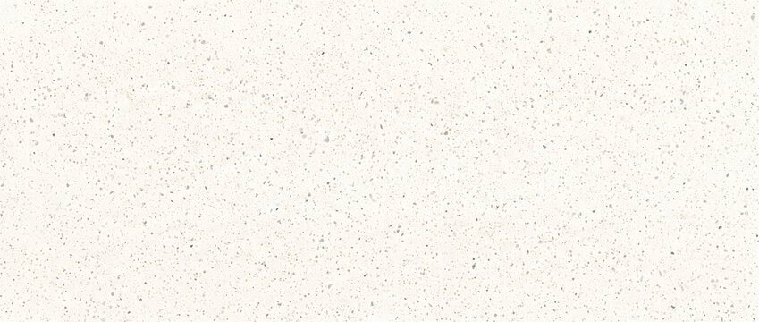 Terrazzo texture background featuring white surface with scattered gray and beige stone chip speckles for interior design projects
