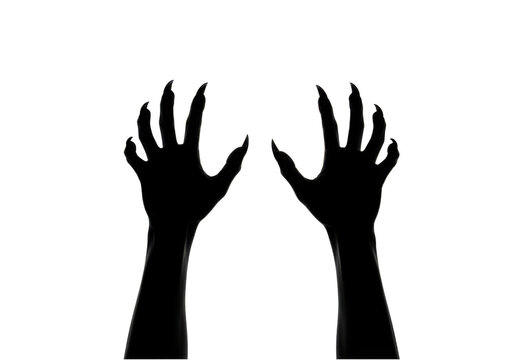 Black silhouette of scary monster hands with long sharp claws reaching out