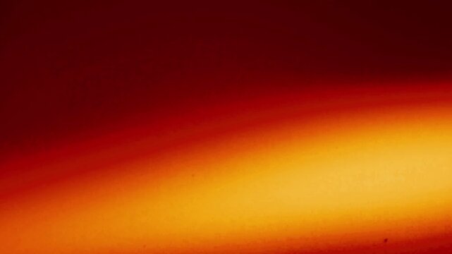 Vintage Film Burn Transition with Natural Light Bleed, Soft Optical Bloom, Dust Particles, Film Grain and Retro Analog Texture