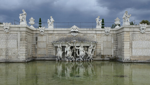 Baroque Triton Fountain in the Gardens of Belvedere Palace in Vienna, Austria. 