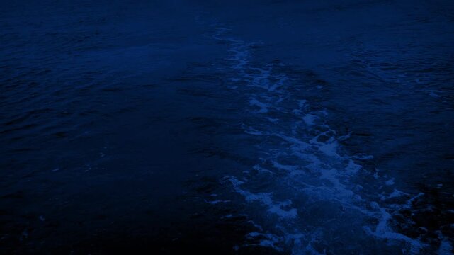 Wake Behind Boat At Night
