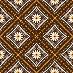 Image of the "Rai Loi Tor" (Floating Field/Interlocking) fabric pattern in brown—a traditional folk textile design. © Saifon