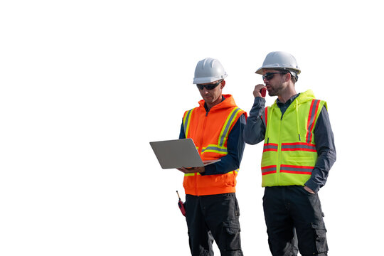 Engineers wearing safety gear, including hard hats examining survey standing industrial facility engaged in a job requires high safety standards concept with PNG white background.