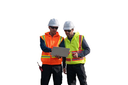 Engineers wearing safety gear, including hard hats examining survey standing industrial facility engaged in a job requires high safety standards concept with PNG white background.