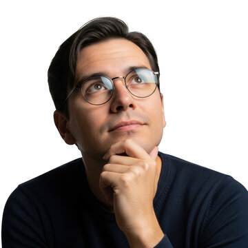 Thoughtful man with glasses looking up while resting chin on hand
