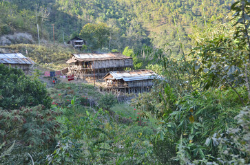 View of the Raga village of the Miri tribe or Mising in the Indian Arunchal Pradesh state © robnaw
