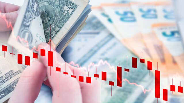 Financial market trading. US dollar and euro banknotes with falling stock chart represent currency volatility, investment risk and economic decline.