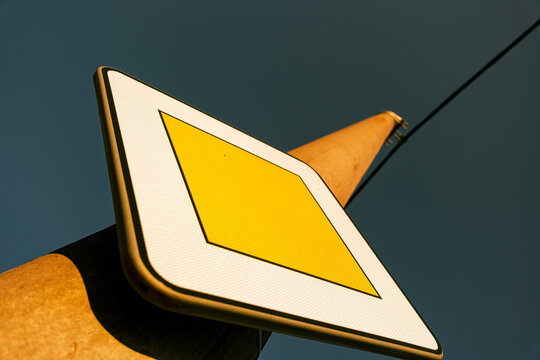 road sign on yellow background