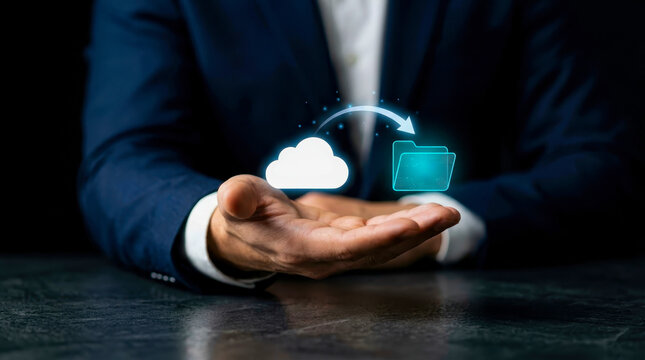 Businessman holding cloud computing icon and file folder for data transfer, storage system, backup and synchronization concept in digital technology, corporate network, cybersecurity.