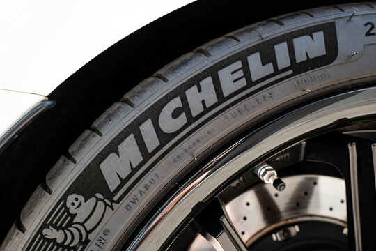 Kemptthal, Zurich, Switzerland, September 6, 2026. Extreme close up of Michelin logo and Bibendum character on a sports car tire.
