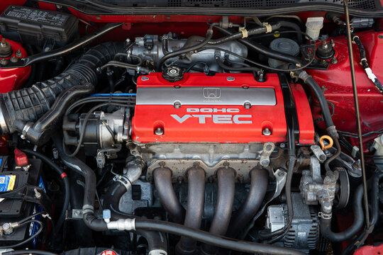 Kemptthal, Zurich, Switzerland, September 6, 2026. Top view of Honda DOHC VTEC engine bay in red car.